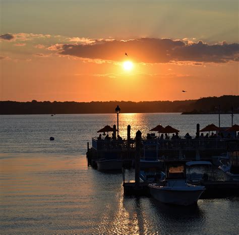 Sunset at the Marina Grill in Belmar, NJ. Seagulls flying in 8/5/21 ...