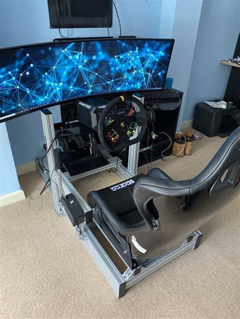 The ultrawide and Racing Sim Rigs UK setup is soooo clean. Polished off ...