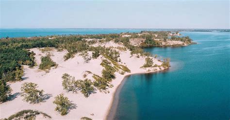 Sandbanks Provincial Park comes with breathtaking dunes and white sand ...