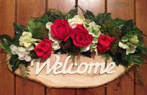 welcome sign decorated with flowers door decor front door