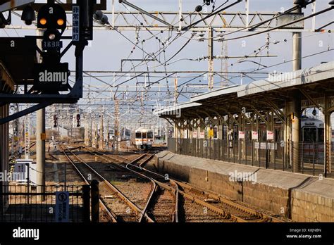 Tokyo, Japan - Dec 25, 2015. A JR train running on track and coming to ...