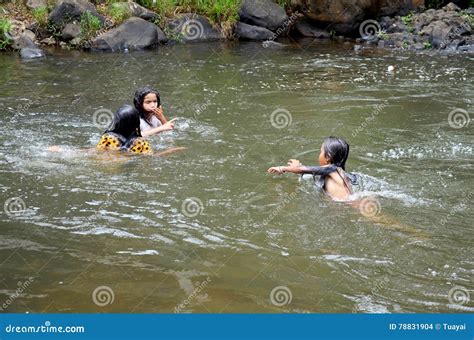 Laotian Girl Setting Out Rice Cakes To Dry In Vientianne Editorial ...