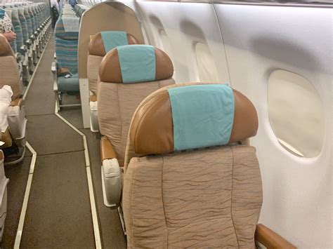 Review - Oman Air Embraer 175 Business Class, Muscat - Dubai - Points ...