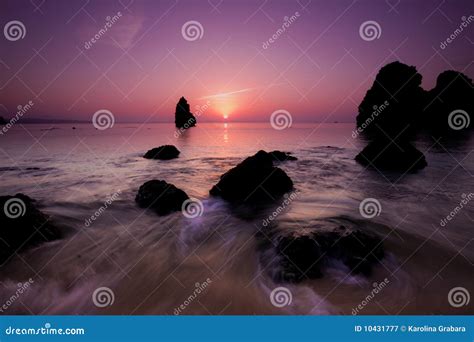 Beach sunset stock image. Image of warm, vacation, rock - 10431777