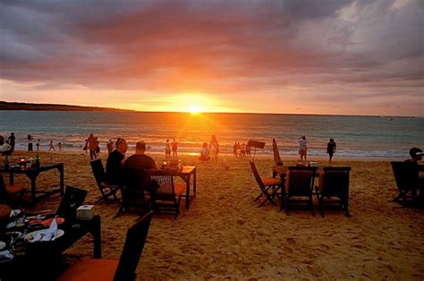 Romantic sunset at Jimbaran Beach, Bali Tourism - Touristnesia Find ...