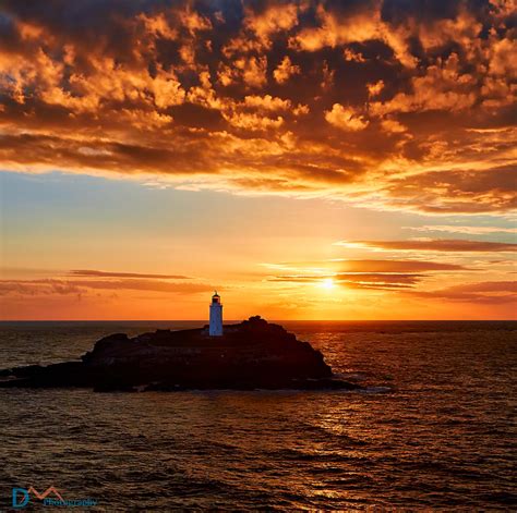 Sunset Over Godrevy Lighthouse in Cornwall | The setting sun… | Flickr