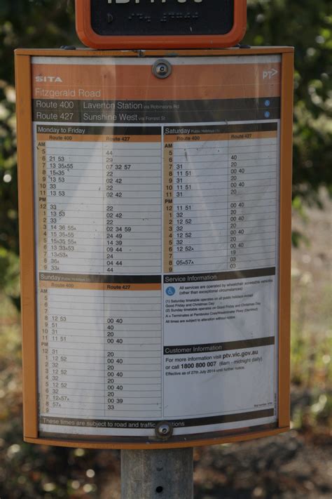 Combined route 400 and 427 timetable at a bus stop on Fitzgerald Road ...