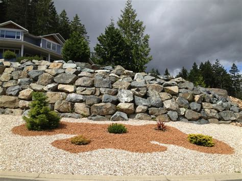 How To Landscape a Hillside with Rocks - Learn how to