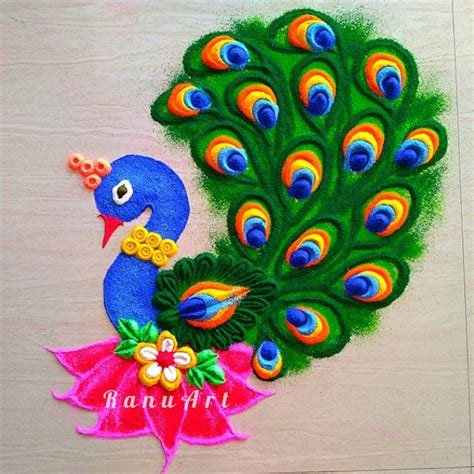 Peacock rangoli designs by Ranuart | Free hand rangoli design, Peacock ...