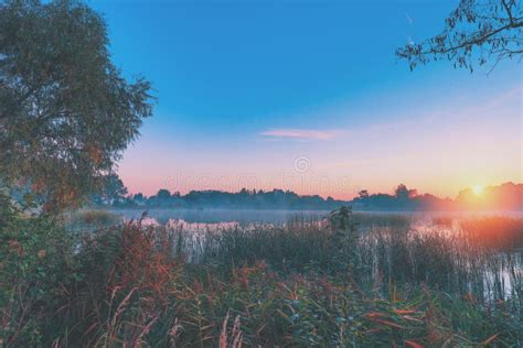 Early Morning, Sunrise Over the Lake Stock Image - Image of dawn, misty ...