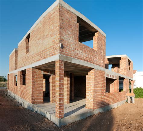 HOUSE CONSTRUCTION IN INDIA: FRAME STRUCTURE vs LOAD BEARING MASONRY WALLS