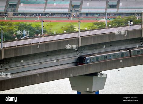 Tung Chung Line train running on Rambler Channel Bridge between Tsing ...