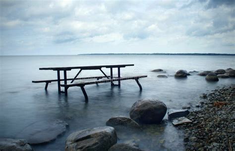 Picnic in the Lake stock image. Image of water, table - 17241223