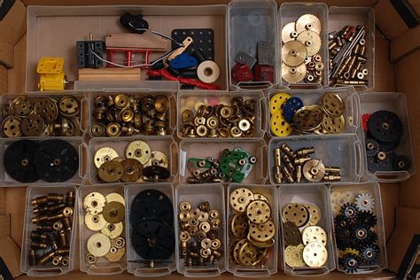 A large collection of Meccano to include brass gears including helicals ...