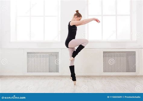 Beautiful Ballerina Stands In Ballet Pirouette Stock Image - Image of ...