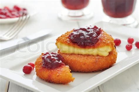 Breaded and baked camembert with ... | Stock image | Colourbox