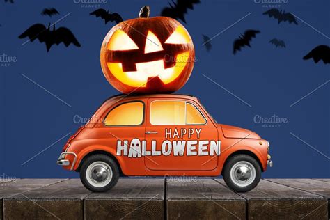 Spooky Halloween Pumpkin on a Vintage Car