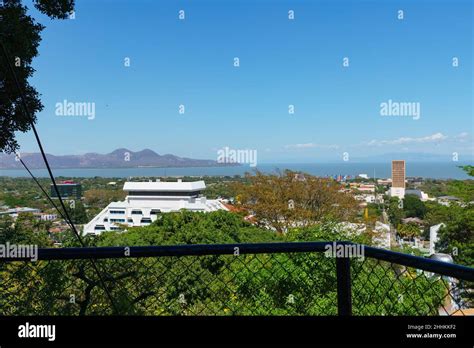 Managua skyline with the Crowne Plaza Hotel in the foreground and Lake ...