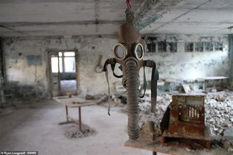 Urban explorer camps in abandoned homes contaminated by the Chernobyl ...