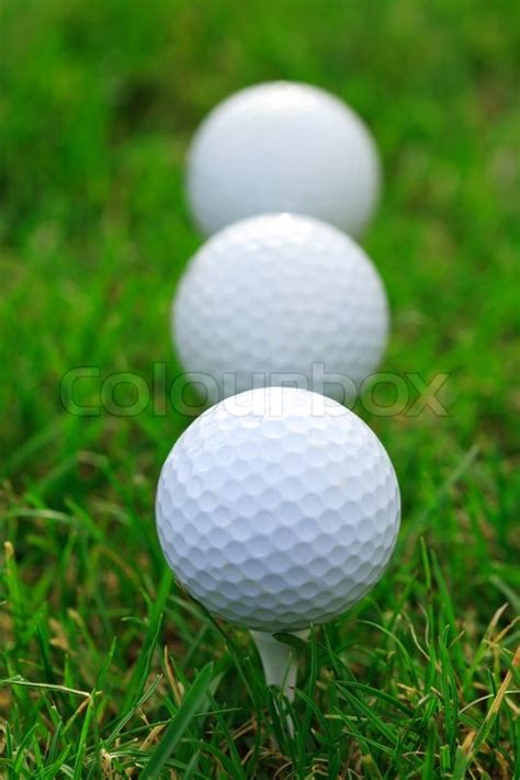 Golf club - 3 balls on the green | Stock image | Colourbox