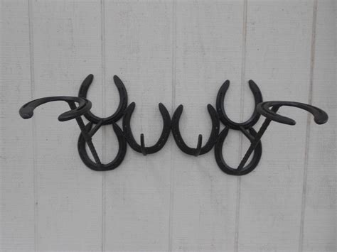 Horseshoe hat rack by RedGateFarm1 on Etsy, $85.00 Horseshoe Projects ...