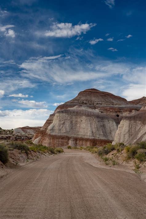 Cathedral Valley Loop Road Turns Left Around Rock Formations Stock ...