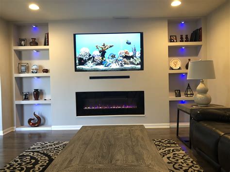 Blue lights under my built in wall unit with electric fireplace ...