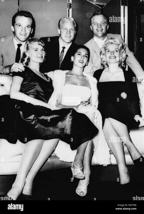 Three of Bing Crosby's sons and their wives, September 1960. Top, from ...