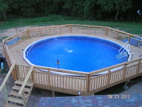 Doughboy Pool with a walk around deck ! Makes your SUMMER amazing fun ...