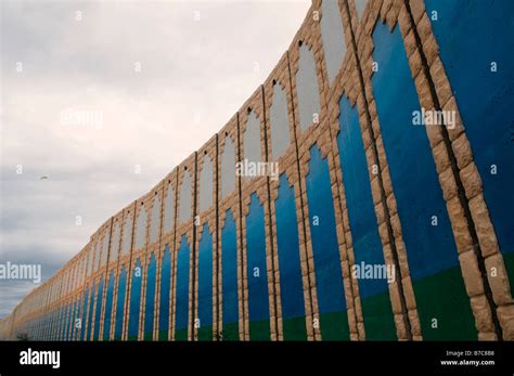 Tall concrete separation barrier wall between Northern Gaza strip and ...