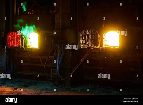 Reverberatory furnace melts copper metal with burning flame Stock Photo ...