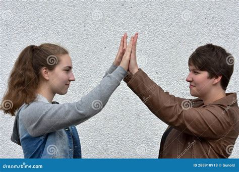 Friends Giving Each Other a High Five Stock Photo - Image of ...