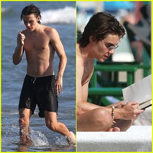 Louis Partridge Soaks Up the Sun During Time Off in Italy – See the ...