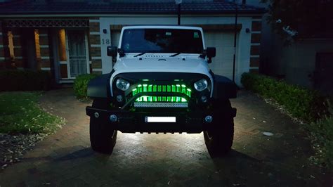 Jeep Wrangler JK - Lux LED Rock lights. 4 underneath and 2 green behind ...