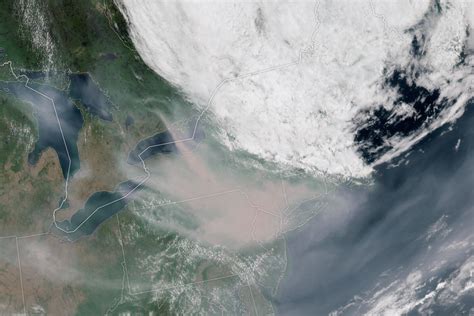 Satellite images show wildfire smoke creeping from Canada across U.S ...