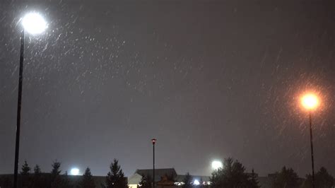 During Snowstorm Two Street Lamps Are Shown Stock Footage SBV-347754563 ...