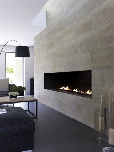 Reconstructed stone wall tiles BRÉCY by ORSOL | Contemporary fireplace ...