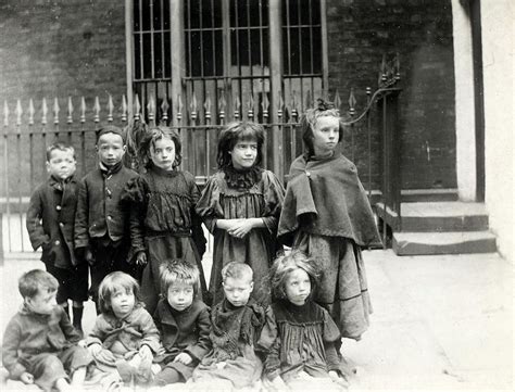 Harrowing black and white pics of bare-footed kids with torn clothes ...