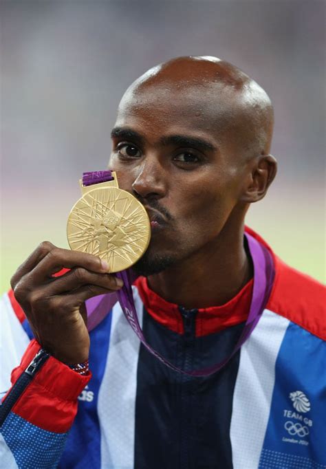 London 2012 - Mohamed Farah of Great Britain kisses his gold medal won ...