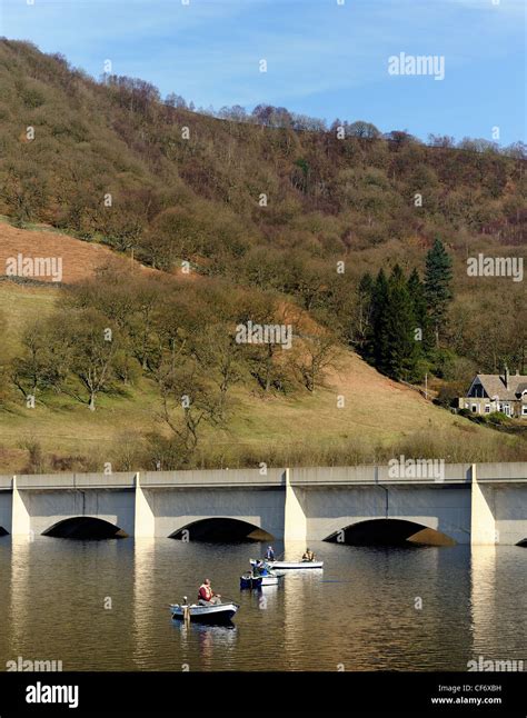 men in boats fly fishing on ladybower dam upper derwent valley ...