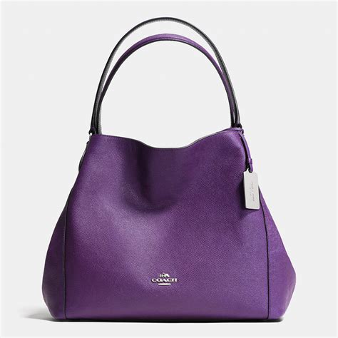 Purple Leather Coach Handbag | IUCN Water