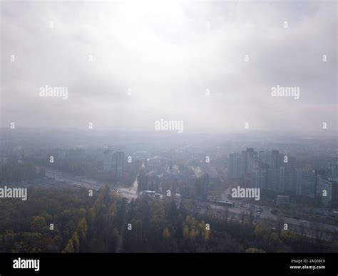 Cityscape with houses on a sunny foggy sky background Stock Photo - Alamy