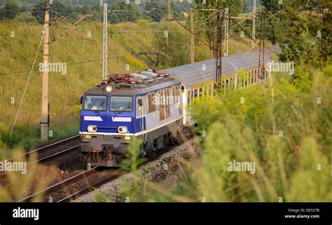 Spring train in meadows Stock Photo - Alamy