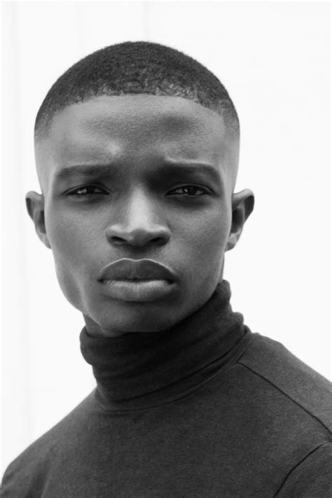 Natural light fashion portrait of new face, Nigerian dark skin male ...