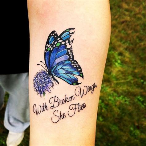 a blue butterfly with words on it and a dandelion in the foreground