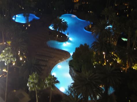 The Mirage Las Vegas Pool lit up at night -- so beautiful! | Mirage las ...