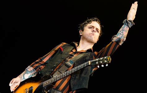 Watch Green Day members make surprise appearance at party to play loads ...