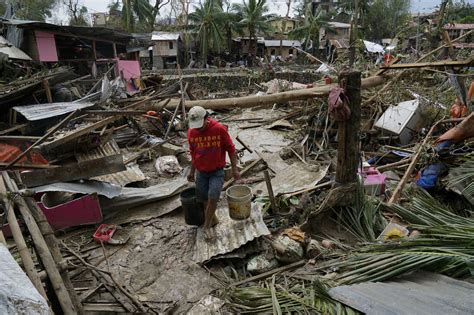 Photos: Typhoon Rai leaves devastation, uncertainty in the Philippines ...