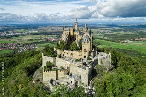 Aerial panorama of Burg Hohenzollern (Hohenzollern castle) with hills ...