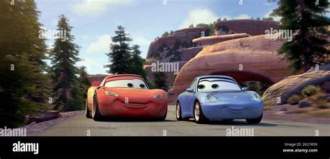 LIGHTNING MCQUEEN, SALLY CARRERA, CARS, 2006 Stock Photo - Alamy